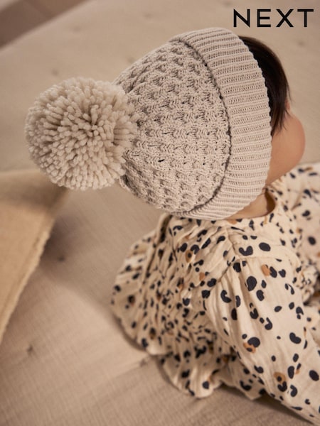 Cream Knitted Pom Waffle Baby Hat (K86250) | £6